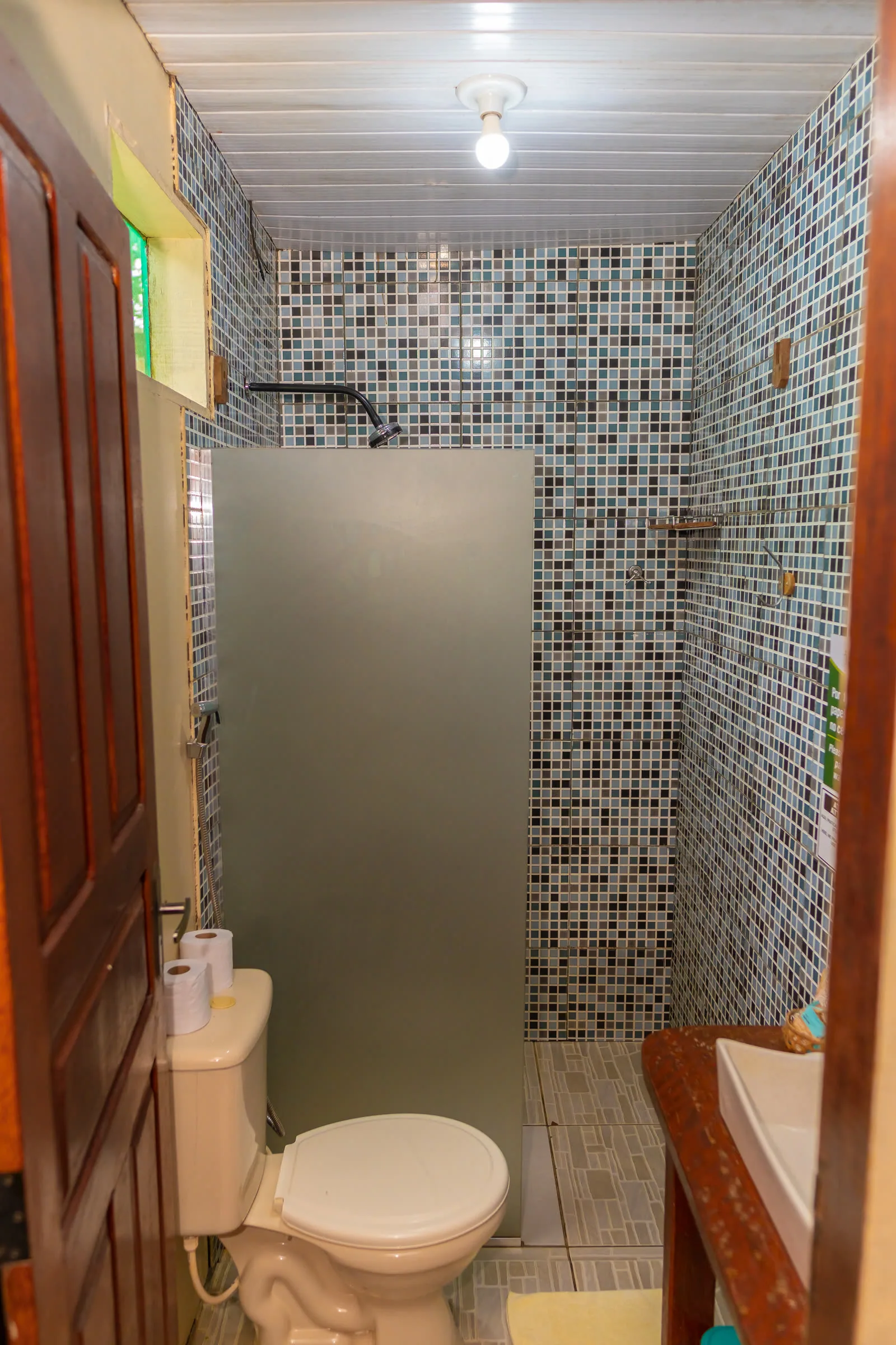 Simple private bathroom in a rainforest lodge