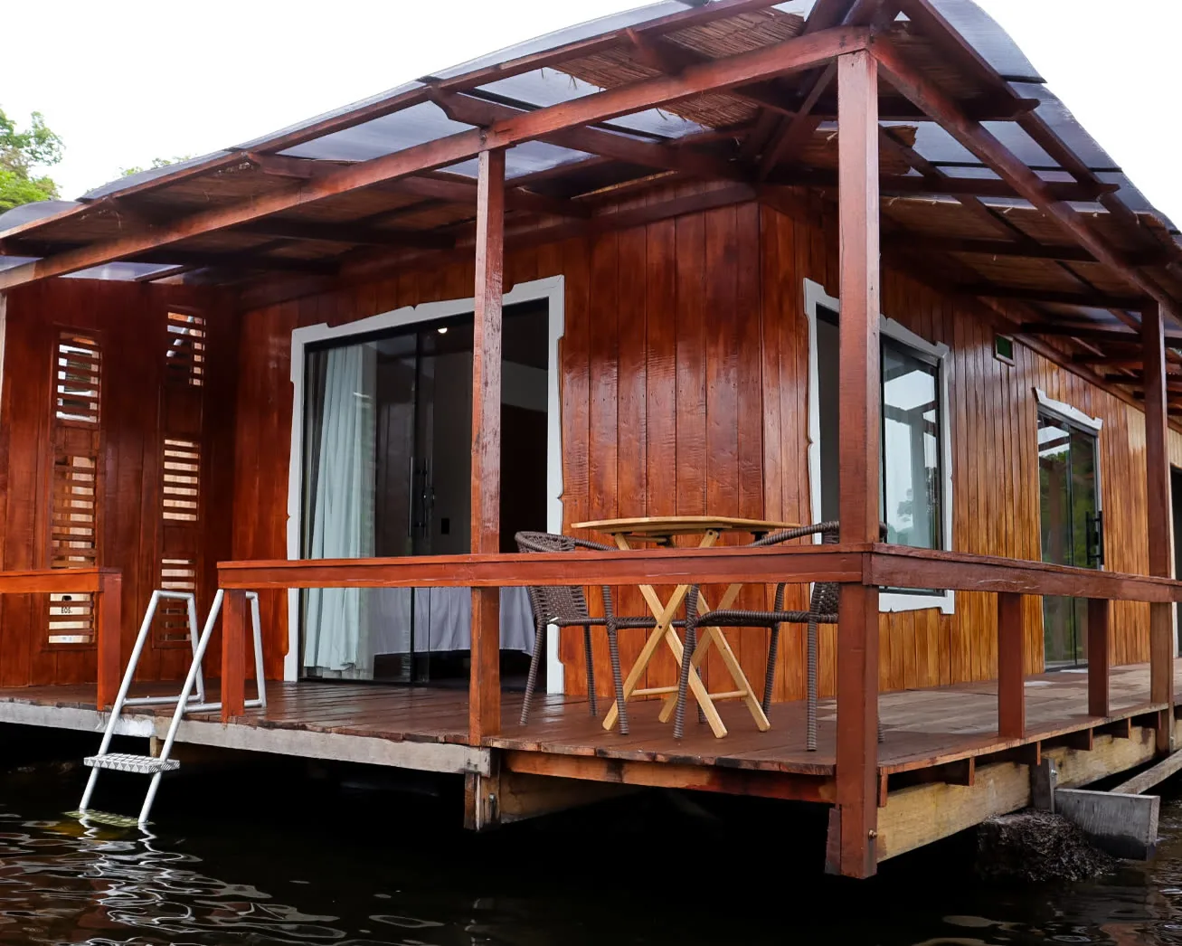 Floating cabin on the river at sunrise