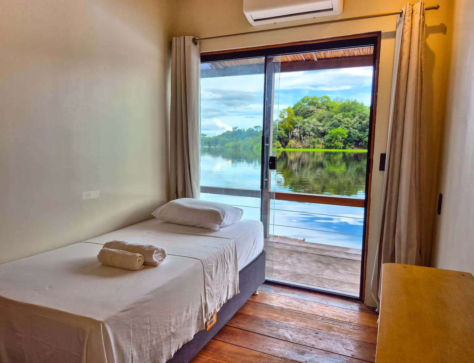 Interior of a floating cabin with river views