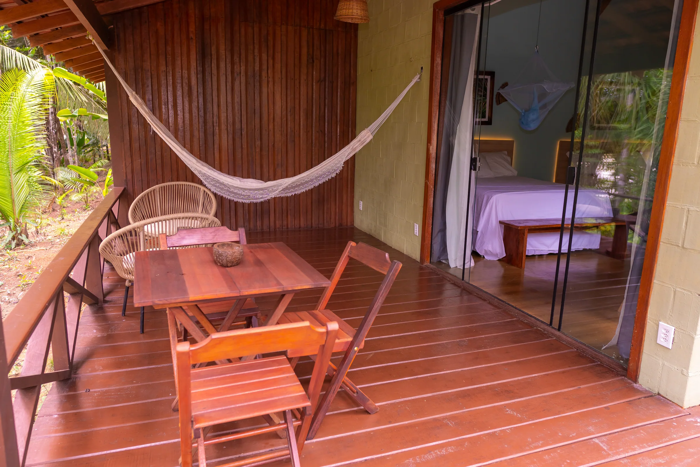 Private veranda with a hammock and seating