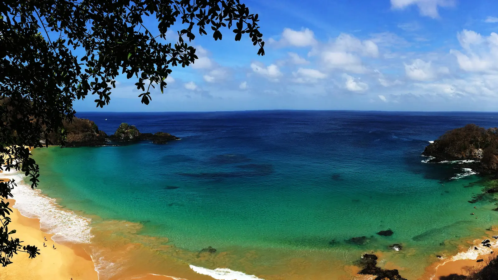 The turquoise bay of Baía do Sancho seen from the clifftop viewpoint on Fernando de Noronha