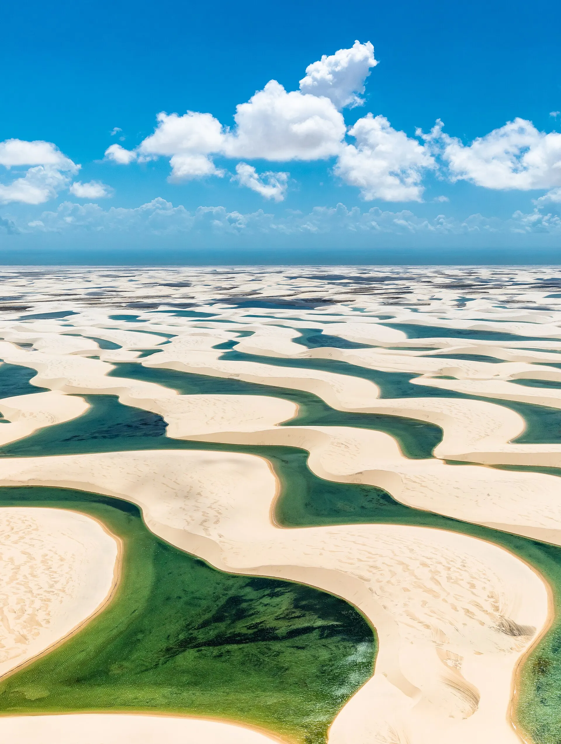 White sand dunes and rain-water lagoons of Lençóis Maranhenses