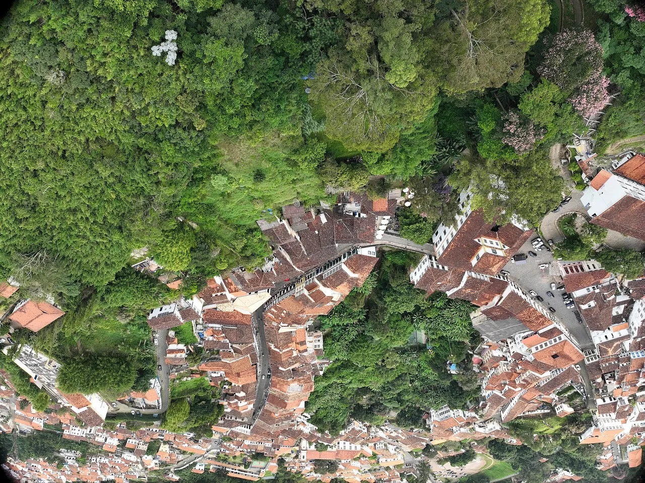 Steep cobbled street with colourful colonial houses in Ouro Preto