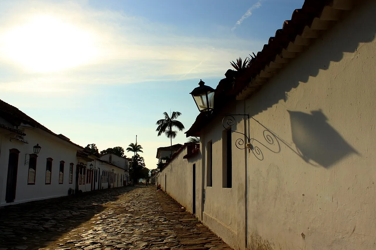 Whitewashed colonial houses on a cobbled street in Paraty's old town