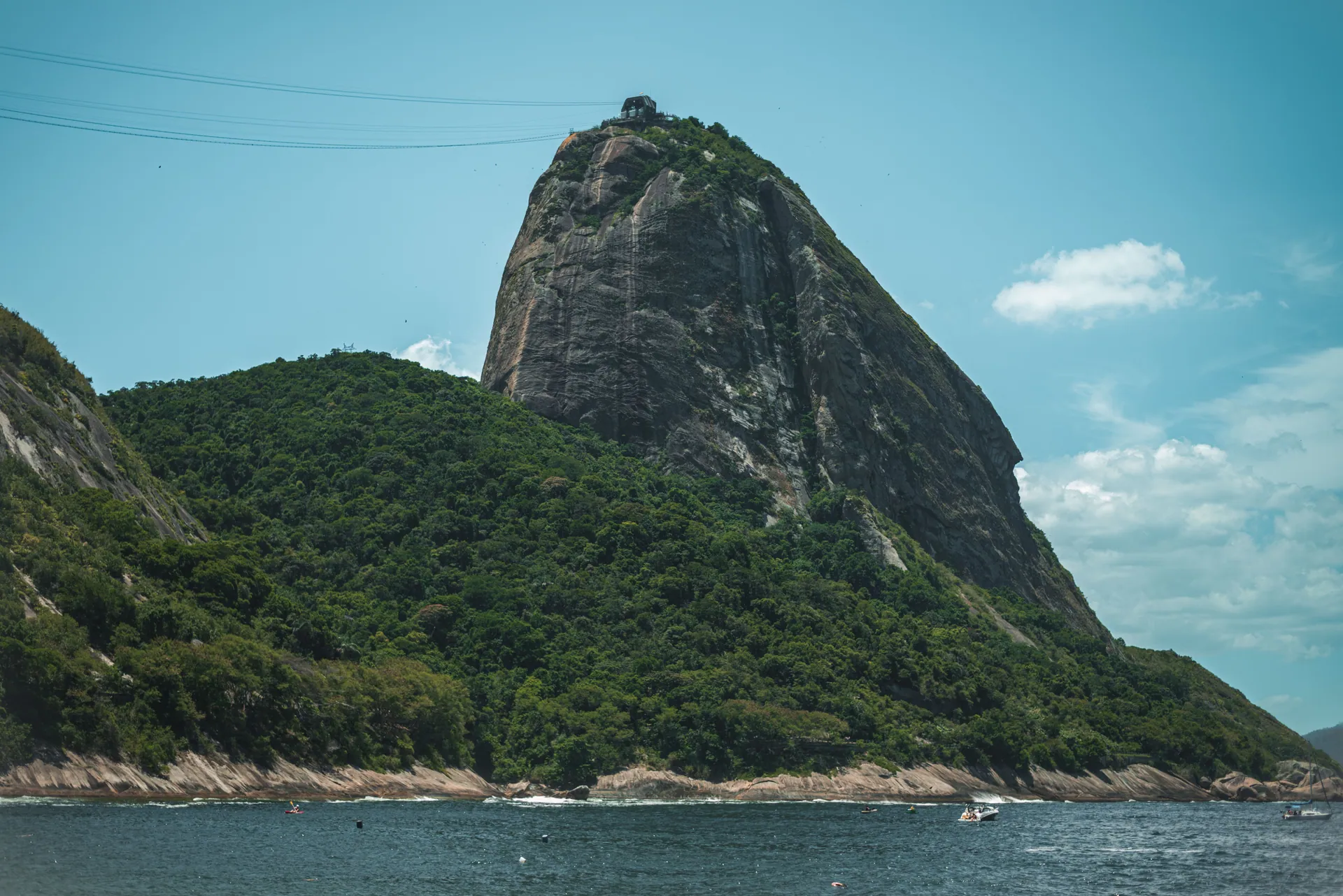 Sugarloaf Mountain rising straight from the bay, seen from the water