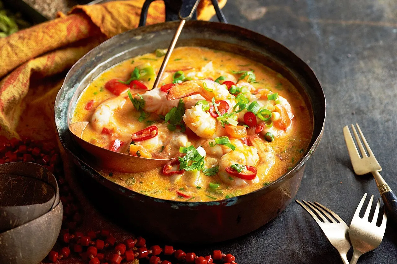 Bahian moqueca seafood stew in a traditional clay pot