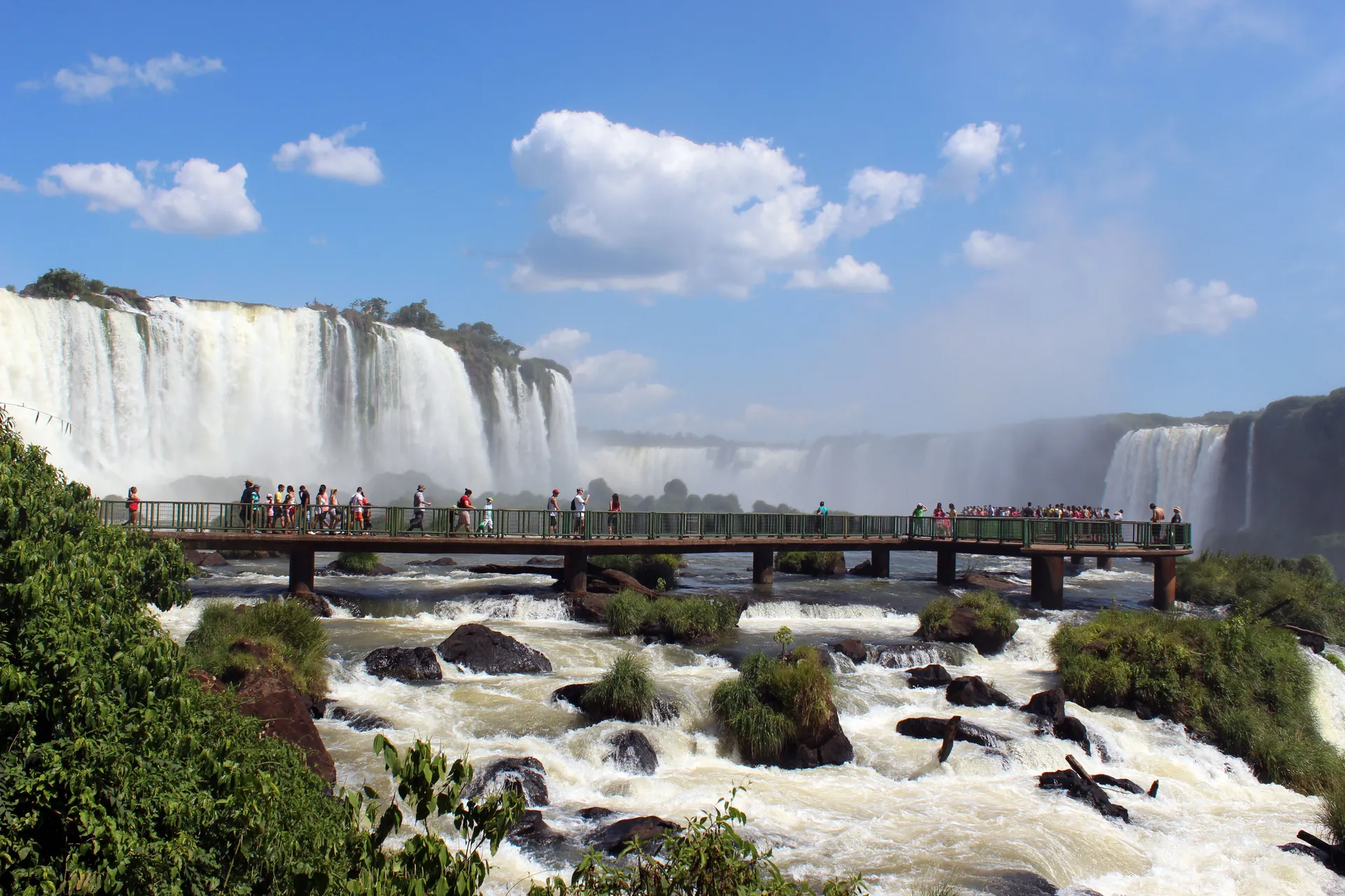 The wide panorama of the Iguaçu Falls seen from the Brazilian side trail