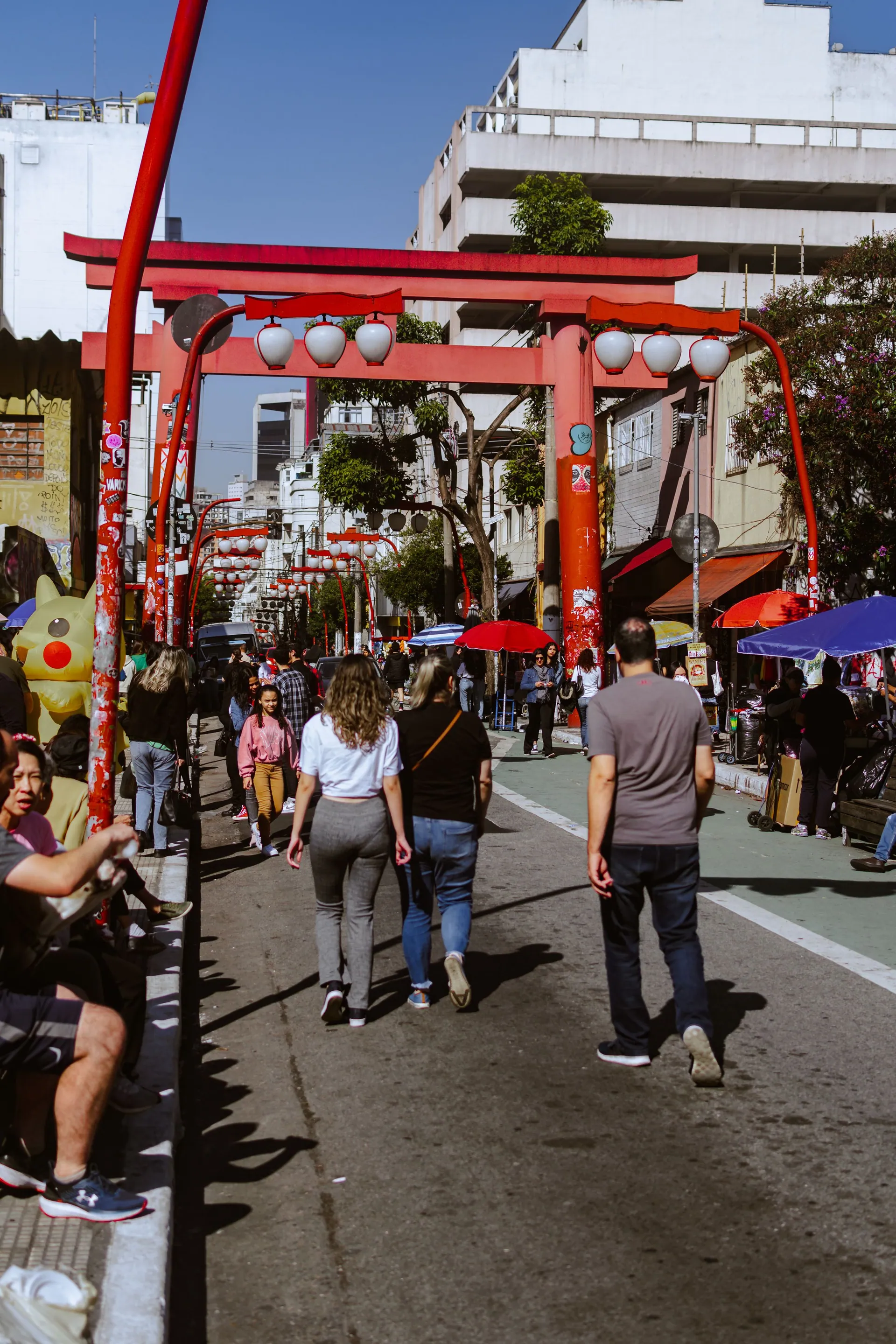 The red torii gates and busy street life of São Paulo’s Liberdade district
